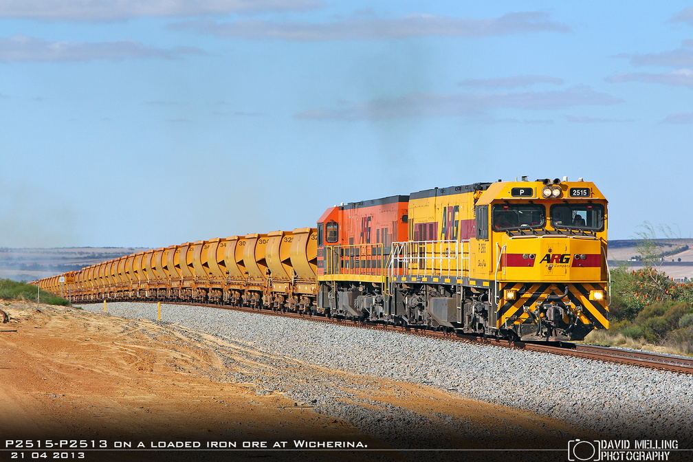 P2515-P2513 on a loaded iron ore at Wicherina. 21.04.2013.jpg